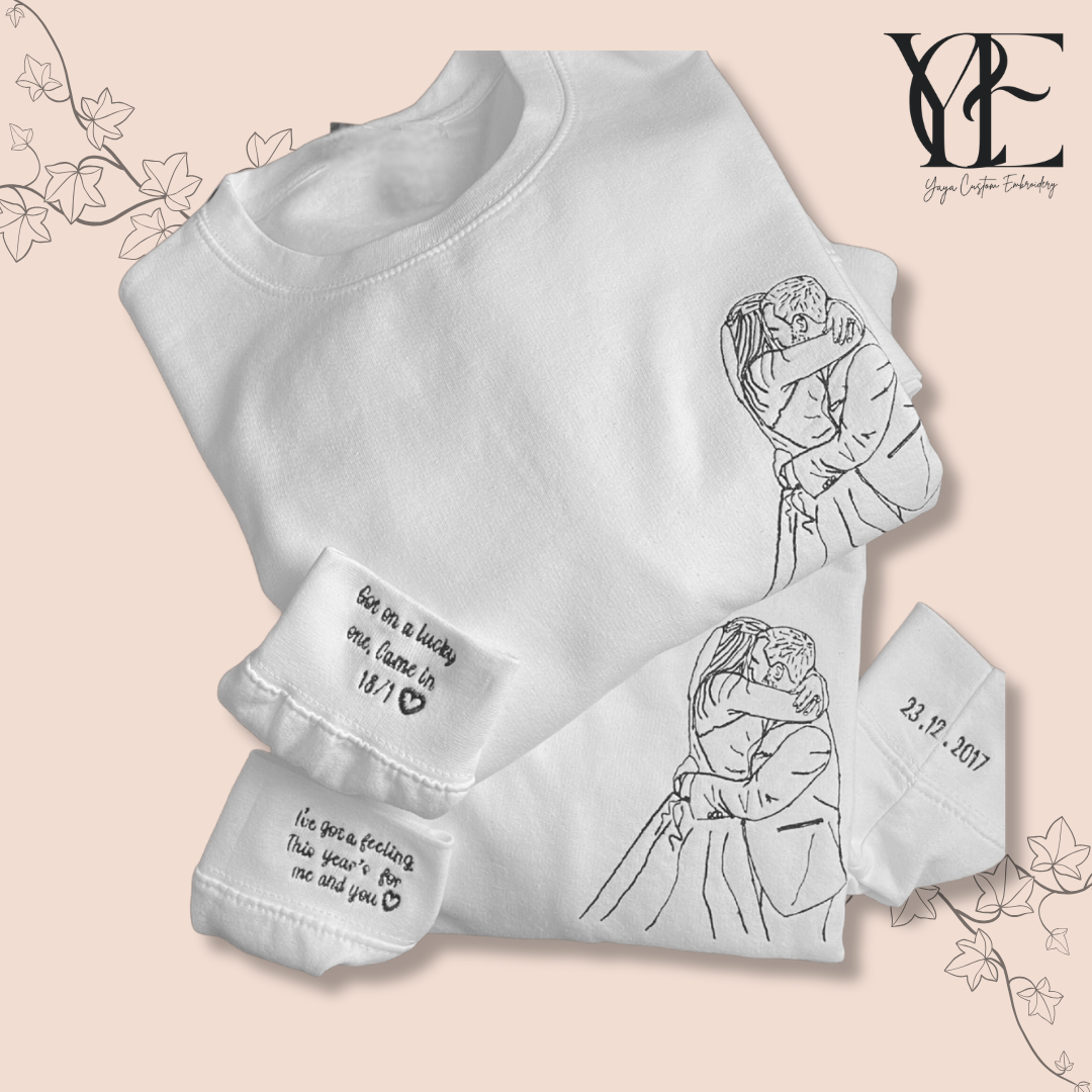 whole composition of the outlined embroidered on the sweatshirts couple