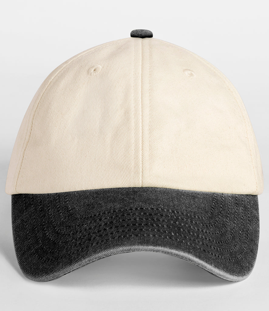 A baseball cap with a cream-colored fabric crown and a dark gray mesh visor, shown against a light gray background.