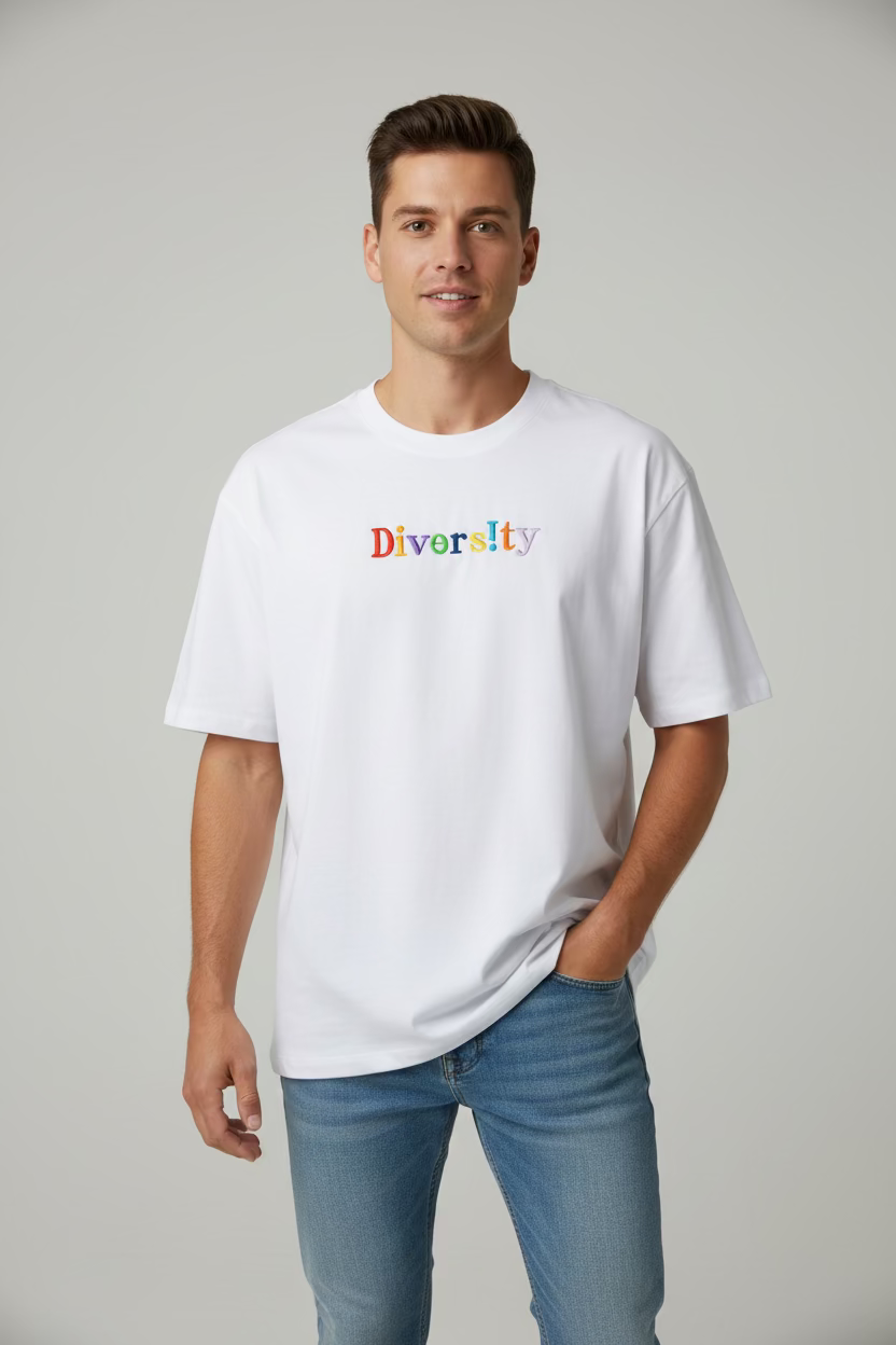 Men with a white t-shirt with 'Diversity' embroidered in colorful letters 