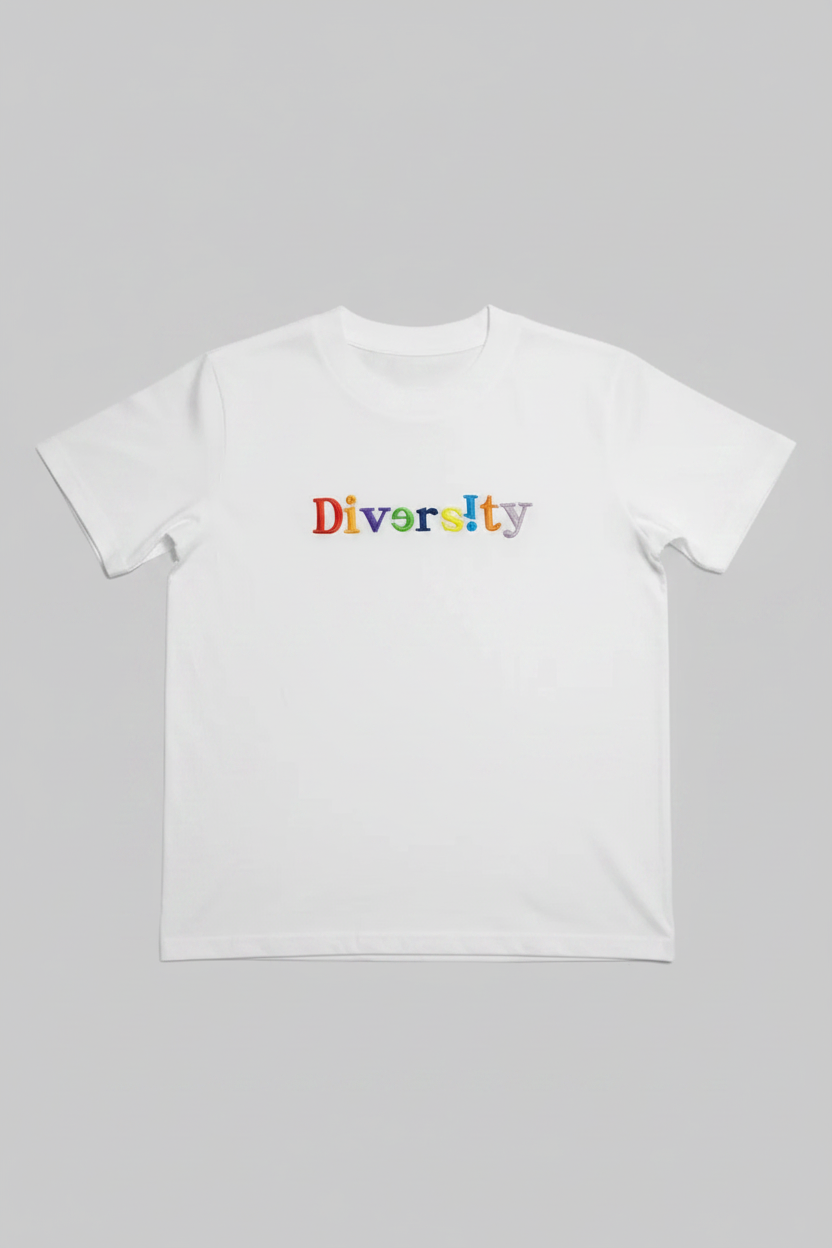 White t-shirt with 'Diversity' embroidered in colorful letters on a gray background